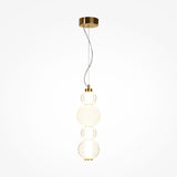 The Collar LED Pendant Light 17W - Gold features a modern gold finish ceiling mount with three vertically arranged globe-shaped lights on a single cable, offering varied textures for an elegant contemporary design against a white background.