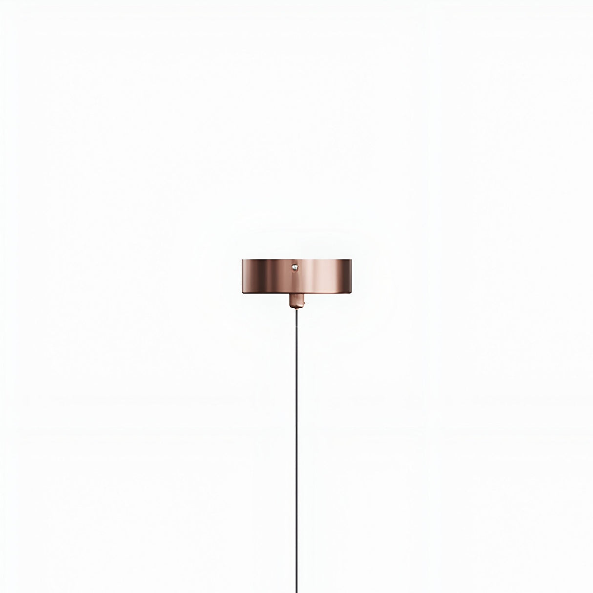 A minimalist image of the Micro LED Pendant Light - Copper, featuring a thin black cord and mounted on a plain white background for a customizable lighting display.