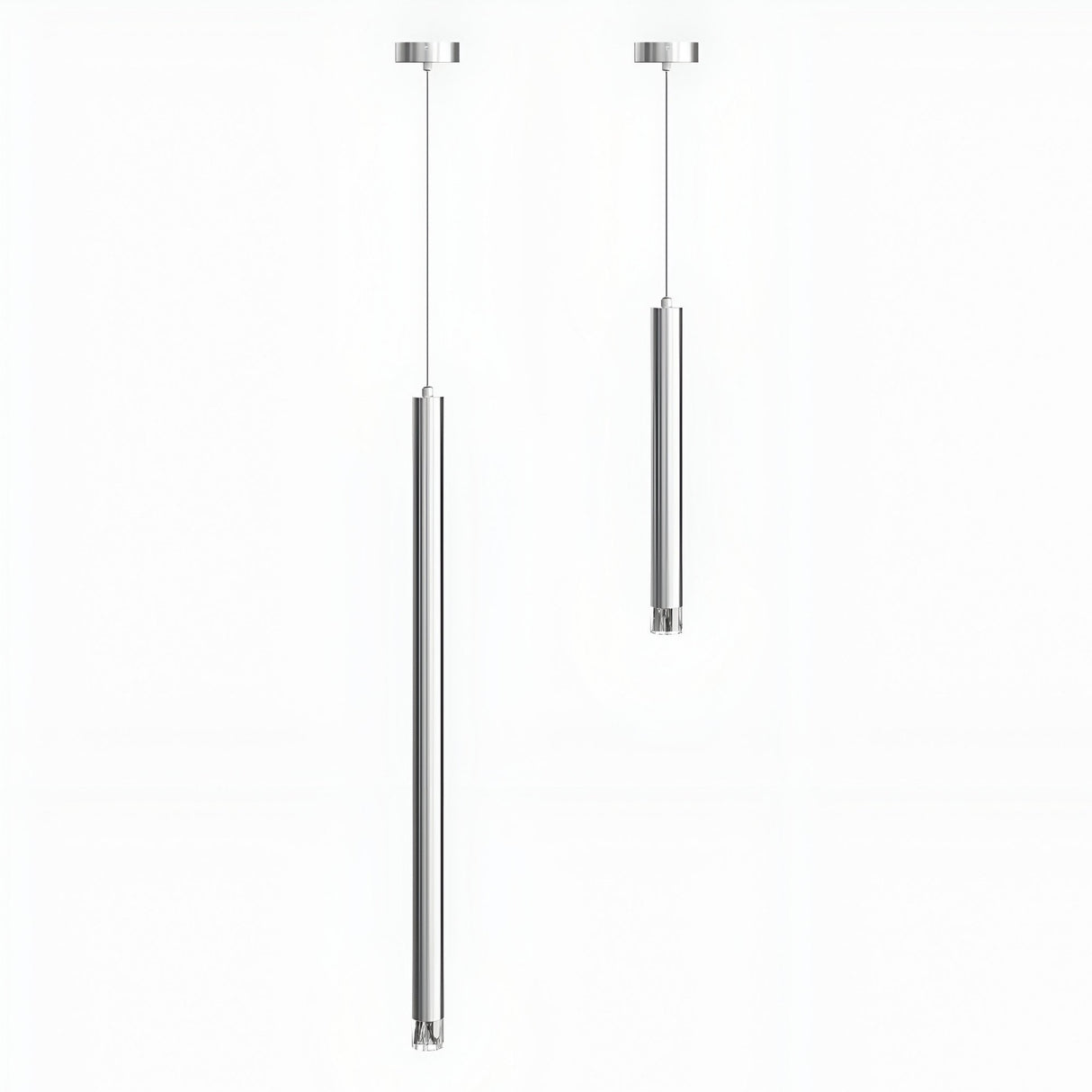 Two sleek Micro LED Pendant Lights - Silver with a contemporary cylindrical design hang from the ceiling on a plain white background; the left light is longer than the right.
