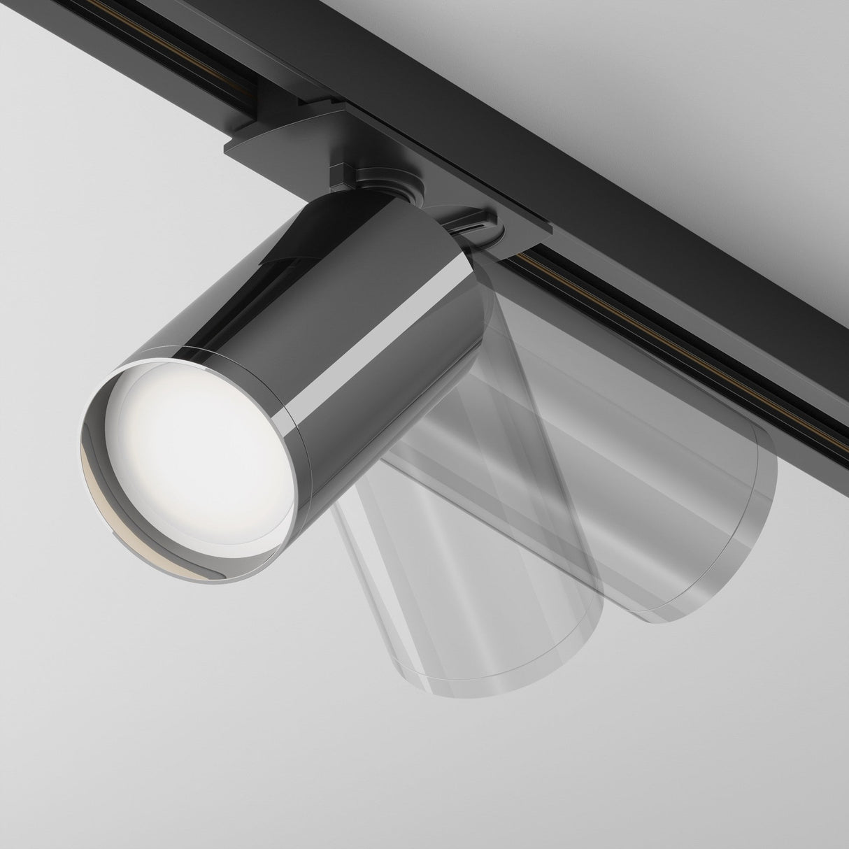 Control and mobility features of Focus S single phase Unity track spotlight in black and graphite, ideal for adaptable installations.