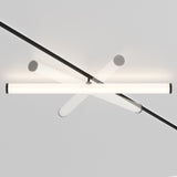 The Larc CCT LED Dimmable Rotating Linear Track Light, designed for Magnetic Exility, features a sleek, horizontal LED tube design with rotating elements that intersect two black bars at different angles for a minimalist geometric pattern against a plain white ceiling.