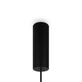 The Bangkok LED Pendant Light 25cm, featuring a sleek black metal fixture and smoky glass shade, hangs against a white background. Suspended by a thin black cord, it softly illuminates the ceiling for a modern minimalist look.