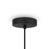 A black cylindrical ceiling canopy with a single cable extends downward, showcasing contemporary elegance. This minimalist design complements a plain white ceiling, reminiscent of the refined style captured in the Roots Pendant Light 60cm - Black & Natural Wood Sphere Rings collection.