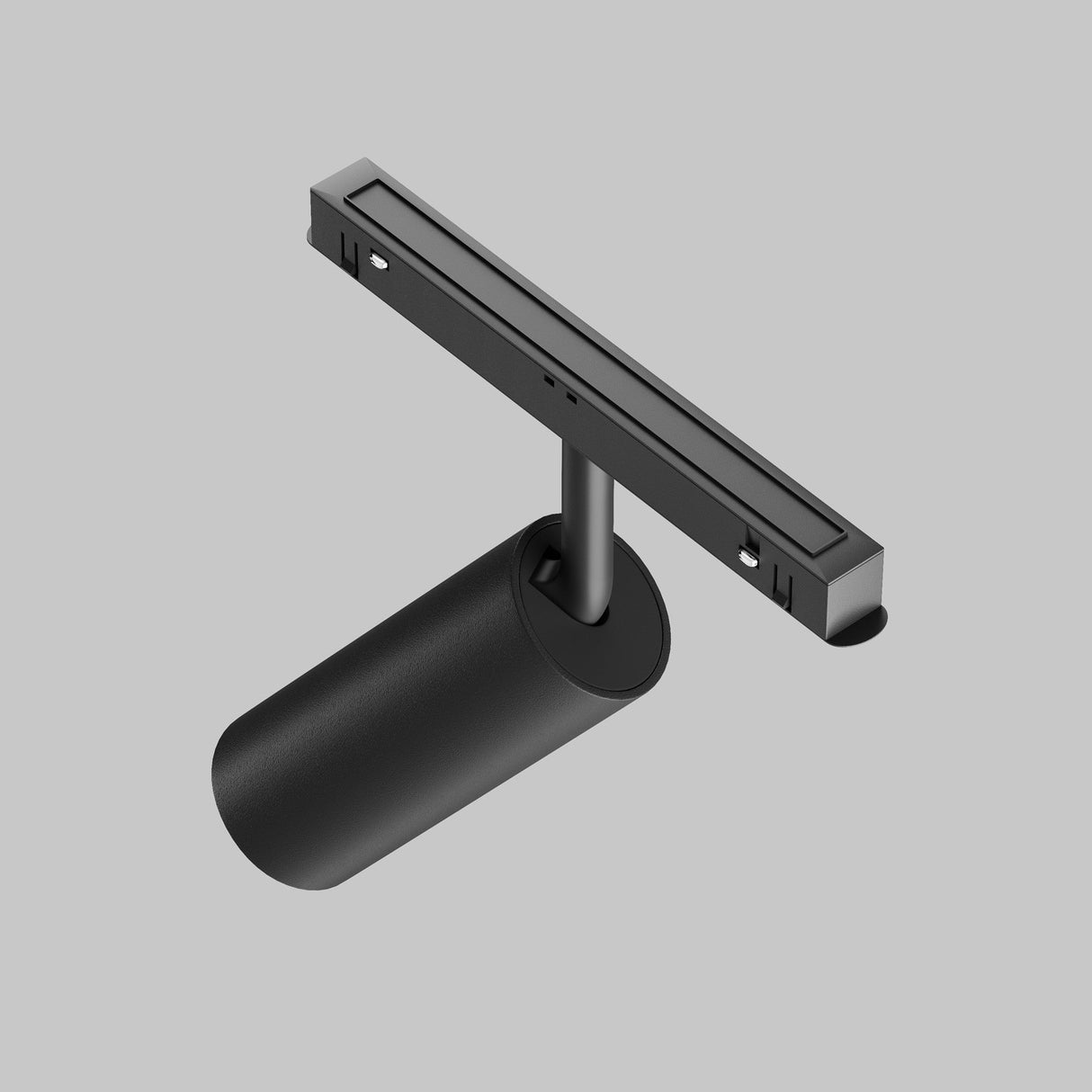 The sleek Focus LED CCT Magnetic Exility Track Spotlight in black features a modern cylindrical design with rectangular mounting hardware against a gray background, seamlessly blending style with advanced smart lighting technology.