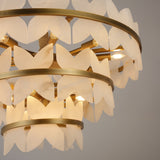 Close-up of Niori Petraia 3 Tier Floral Alabaster Chandelier showing scalloped white alabaster petals on brushed brass rings with lit E14 candle bulbs.