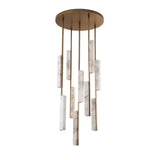 Niori Selvara 10 light cluster chandelier with staggered natural alabaster bars suspended from a round brushed brass canopy on a white background.