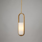 Niori Eliona Capsule pendant light featuring a natural alabaster cylinder in a brushed brass frame, suspended from a slim rod against light grey.