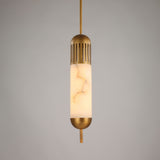 Zerith LED alabaster tube pendant light with fluted brushed brass collar and domed brass base cap, on a plain grey background.
