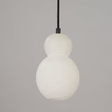 Orlune sculpted pear alabaster pendant light in soft white by Niori, with double-gourd form on a black cord against a plain grey background.