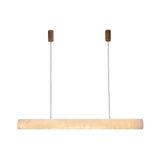Zareon LED Medium Linear Alabaster Chandelier in soft white, a horizontal cylindrical pendant with brass-finish ceiling caps and twin cable suspensions, shown against a plain white background.
