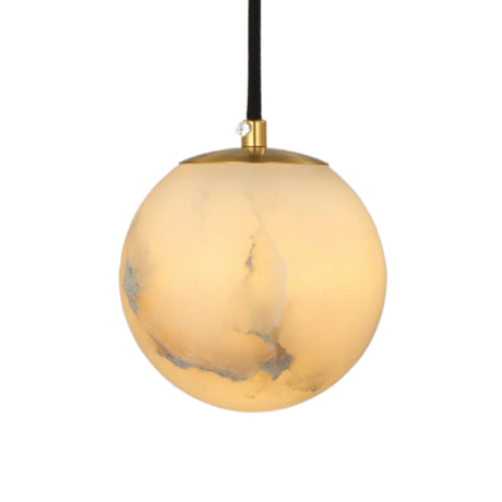 Lyvane globe pendant light in natural alabaster with a brushed brass ceiling cap and black flex, glowing warm white against a plain background.