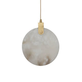 Niori Luna LED Medium 250mm alabaster disc pendant with brushed brass hinge and suspension cable, shown on a plain white background.