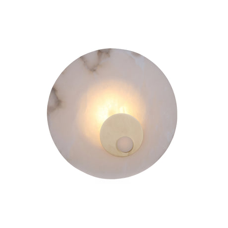 Selvana LED Small Alabaster Wall Light in Soft White, a round natural alabaster disc wall light with a brushed brass centre boss, glowing warm white on a plain white background.