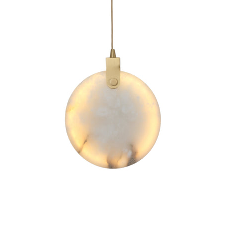 Niori Luna 200mm alabaster disc pendant light illuminated warm white, with brushed brass hinge and slim suspension cable, shown on a plain white background.