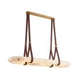 Cintura Large LED island chandelier with an elongated oval alabaster ring suspended by brown leather straps from a brass top bar, shown on a plain white background.