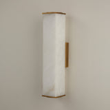 Valmere LED Small Linear Alabaster Wall Light in Soft White, a rectangular natural alabaster panel with brass end caps and mounting bracket, shown on a plain neutral wall.