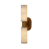 Niori Lumara 2 Light Twin Tube wall light with vertically stacked alabaster cylinders and a brushed brass collar and backplate, on a white background.