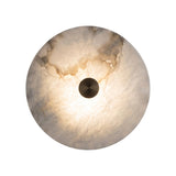 Cerchio LED Round Alabaster Wall Light 30cm in Brass, a circular natural alabaster disc with a small central brass boss, glowing warm white against a plain background.