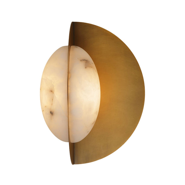 Niori Althia LED wall light with rounded Spanish alabaster diffuser set against a half-moon brushed brass backplate bisected by a horizontal disc.