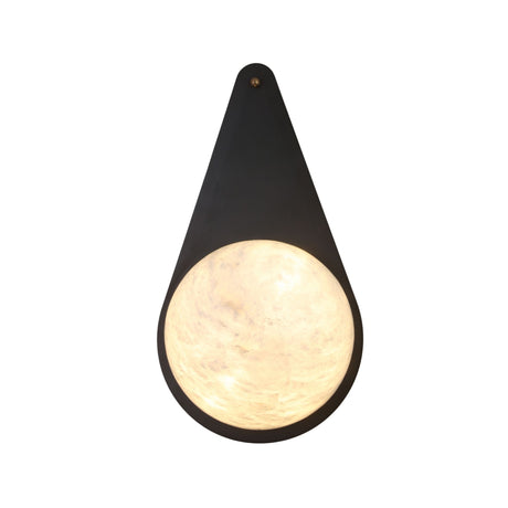 Niori Lunara teardrop wall light with matt black copper backplate, natural Spanish alabaster disc lit from within, and brass pin fixings.