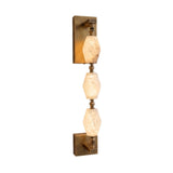 Brisalda 3 Light Faceted Alabaster Wall Light in brushed brass, three angular alabaster stones stacked on a slim rod between rectangular brass wall plates, shown on a plain white background.