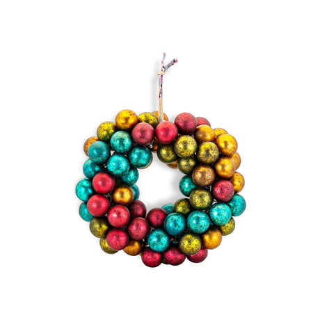 Oko Mini Bauble Christmas Wreath in mixed matt glass baubles of teal, deep red, ochre, olive and brown, hung from a twisted sari tie on a plain white background.