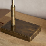 Thenkara Directional Desk Lamp - Antique Brass in a study, view 12