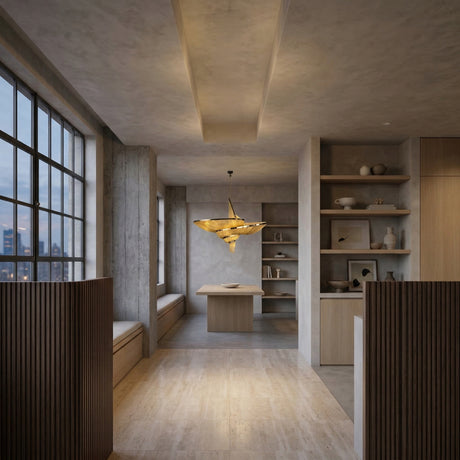 A modern, minimalist dining room with wood floors, a central table, built-in window seating, open shelves, and a Stratiform 20 Light Metal Chain Veil Chandelier in gold as an elegant sculptural fixture hanging from a recessed ceiling.