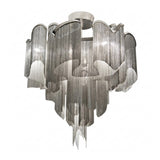 The Valora 8 Light Metal Chain Veil Semi-Flush Ceiling Light in Nickel features cascading layers of silver metal chains, forming a graceful wave-like design suspended from a circular ceiling mount.