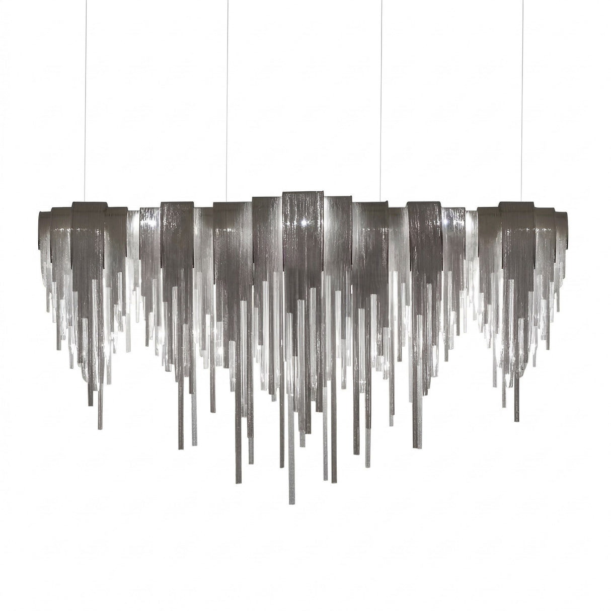 Niori Symphonia 10 light chandelier with stepped nickel canopy and cascading brass chains in a tapered veil silhouette, shown on a white background.
