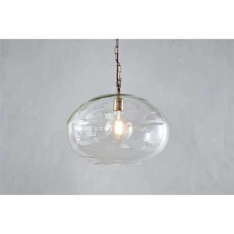 Otoro Large Round Recycled Glass Pendant Light in clear glass with a flattened spherical shade, brass collar and chain, visible E27 bulb, shown against a plain light background.