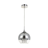 The Fermi Small Dome Pendant Light in nickel and clear glass features a spherical shade with a minimalist design. Its partially transparent bottom reveals delicate crystal-like accents elegantly suspended from the ceiling.