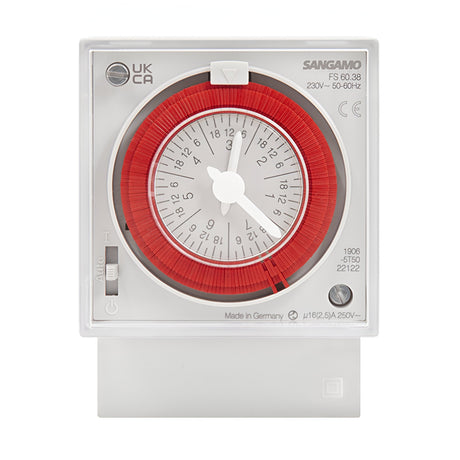 The Panel 7 Day Analogue Timer Switch is designed in white with a red dial, featuring numbered markings for setting time intervals. It includes voltage-free changeover contact and is labeled with technical specifications and the brand name.