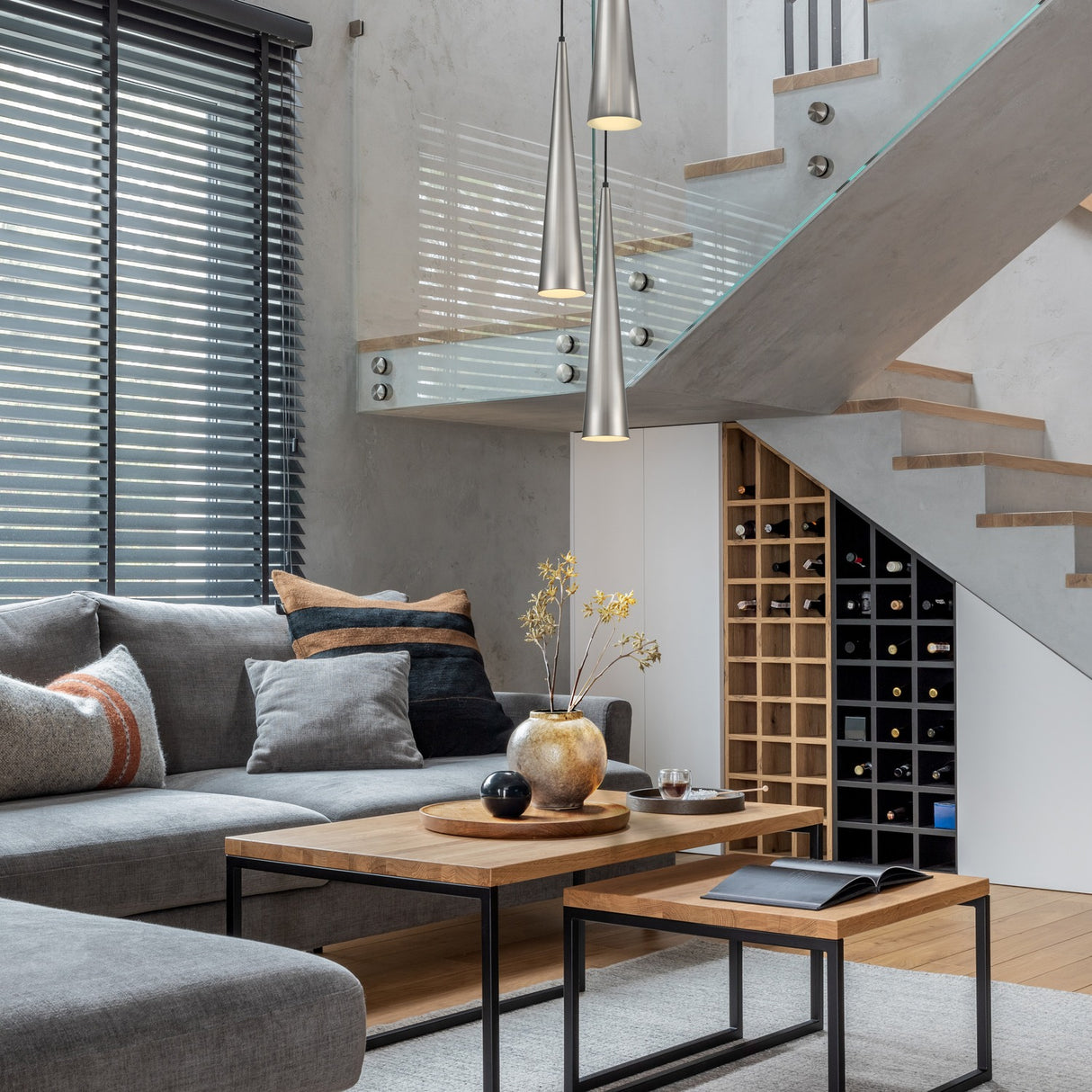 Konos pendant light in satin nickel finish, shown in a room setting