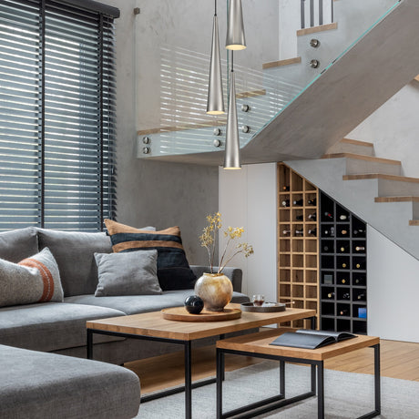 Konos pendant light in satin nickel finish, shown in a room setting