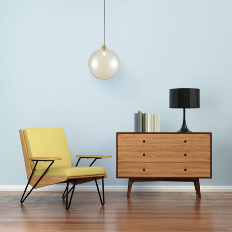 Galaxy pendant light in gold finish, shown in a room setting