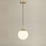 Galaxy pendant light in gold finish, shown on a dark background