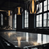 Flare ceiling light in black and gold finish, shown in a room setting