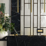 Chime pendant light in brass finish, shown in a room setting