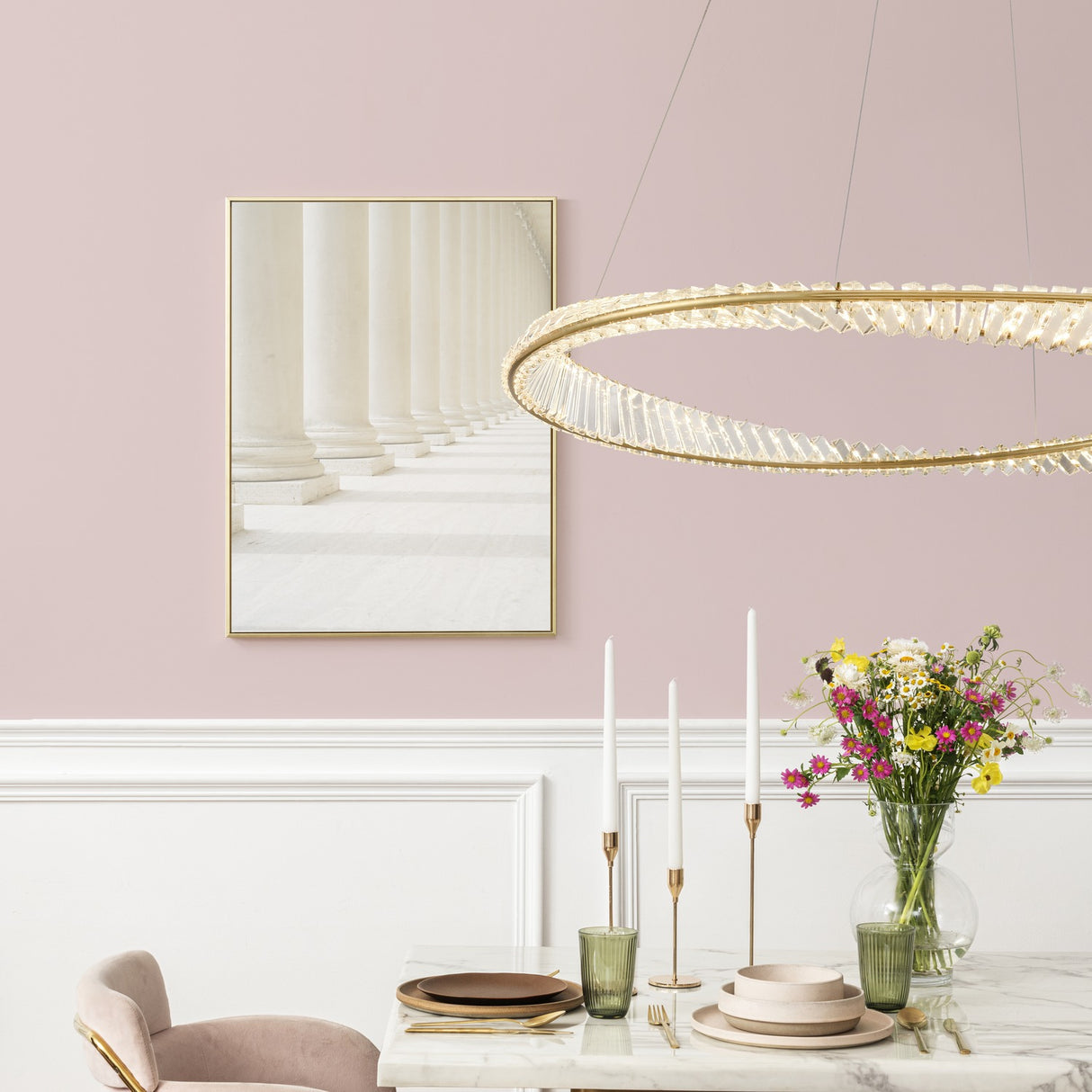 Cleopatra chandelier in brass finish, shown in a room setting