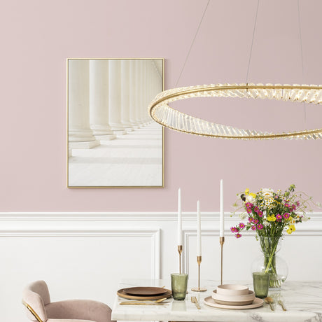 Cleopatra chandelier in brass finish, shown in a room setting