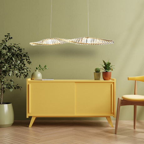 Cleopatra chandelier in brass finish, shown in a room setting