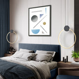 Eclipse pendant light in black and gold finish, shown in a room setting