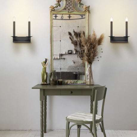 Tudor 2 light wall light in black finish, shown in a room setting