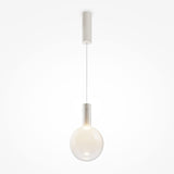 The Nebula LED Pendant Light 20cm showcases a minimalist design with a misty white glass sphere, elegantly suspended on a thin cord. This energy-efficient LED emits a soft glow, enhancing its sophisticated look against a plain white backdrop.