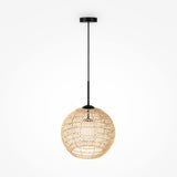 A Cane Pendant Light 30cm in black and beige wicker with a white glass diffuser hangs from an adjustable wire against a white background, radiating a warm glow through the woven shade.