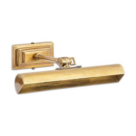 Pania Picture Wall Light in antique brass, featuring a long half-round trough shade on a stepped rectangular wall bracket with a knurled adjustment knob, shown on a plain white background.
