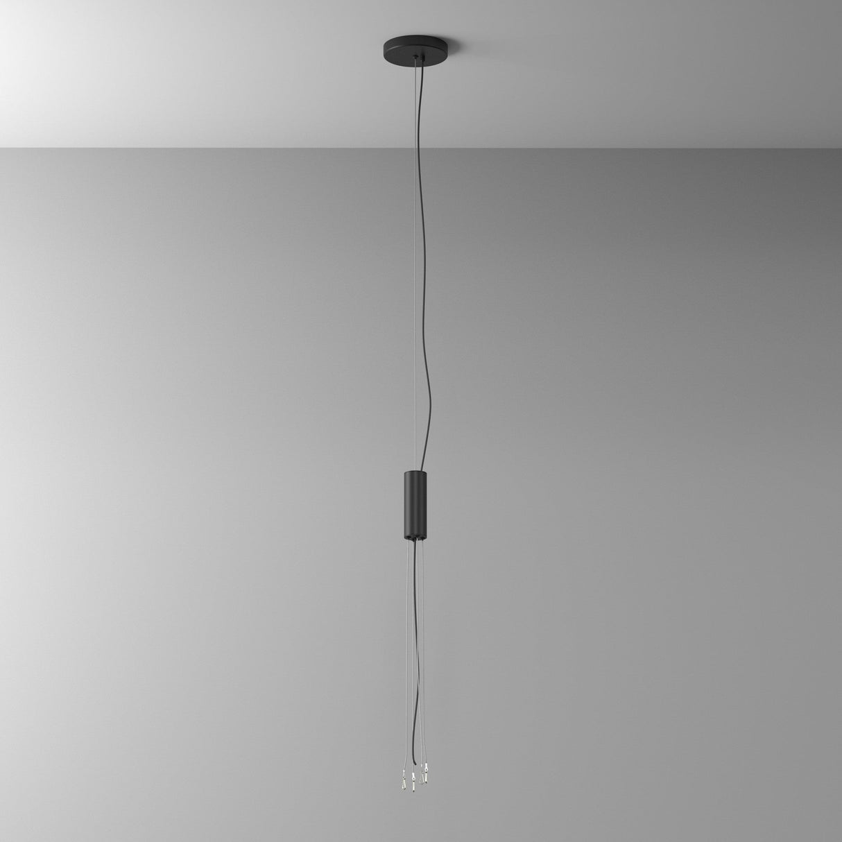 The Zon Universal Pendant Set Light Fitting - Black offers modern lighting with a sleek black ceiling mount and thin cord supporting a slim vertical cylinder. Its three LED lights and subtle metallic accents make it perfect against any plain gray background.