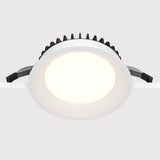 Side view of Okno LED Round Recessed Downlight in white, highlighting the fixture’s elegant curves and discreet design