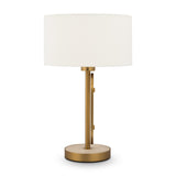 The Marmo Table Lamp features a gold-plated brass base and a cylindrical white fabric shade. Its sleek design, with a circular base and vertical rod, elegantly complements any space, enhanced by natural stone plates.
